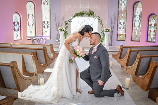 A bride kissing her husband on their wedding day in Vegas