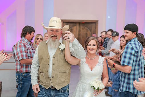 A couple holding hands on their vow renewal ceremony in Las Vegas