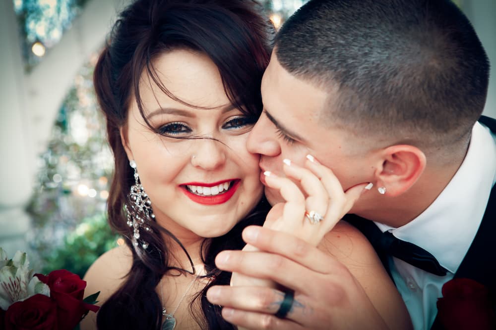 Newlyweds kissing on their wedding day at the Terrace Gazebo in Las Vegas