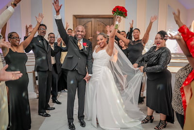 A celebratory group wedding photo in Vegas