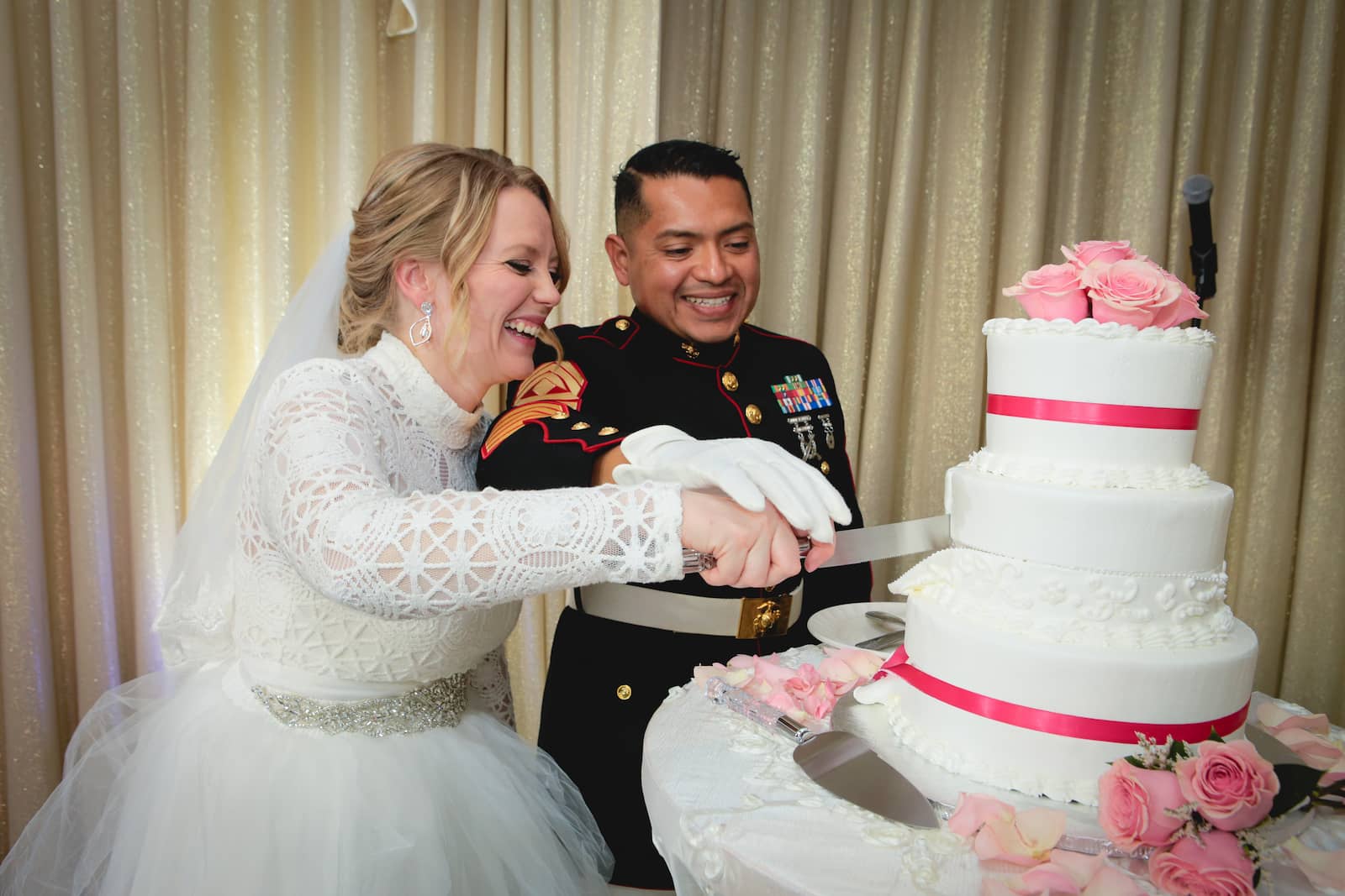 Newlyweds cutting their cake on their reception in Vegas