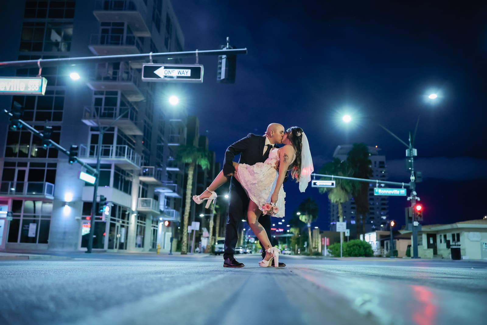 Newlyweds and their hummer in the drive thru chapel