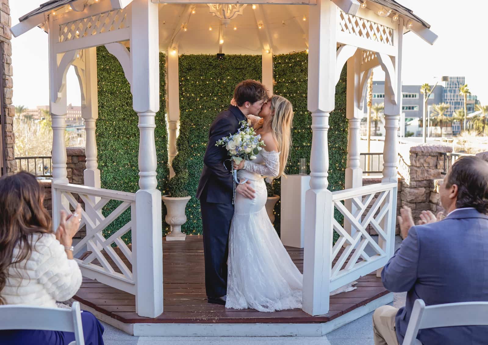 Newlyweds hold hand in The Wedding Garden chapel