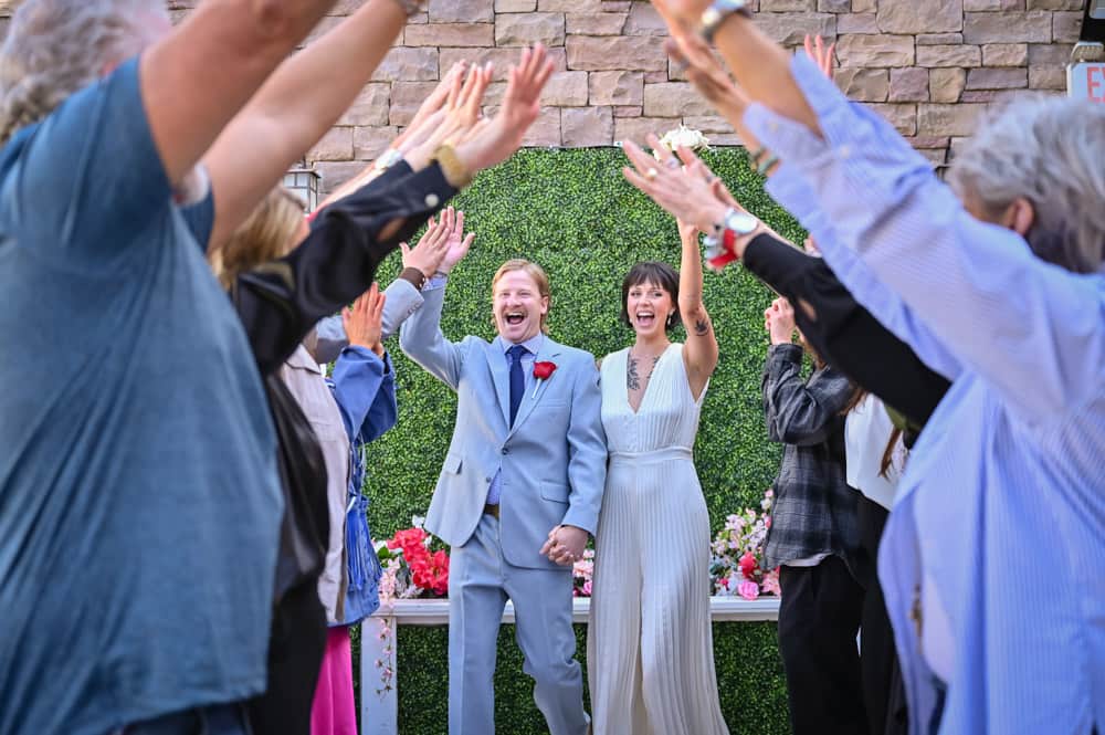 A happy coupe dancing on their special day after choosing the Intrigue Wedding & Reception Package
