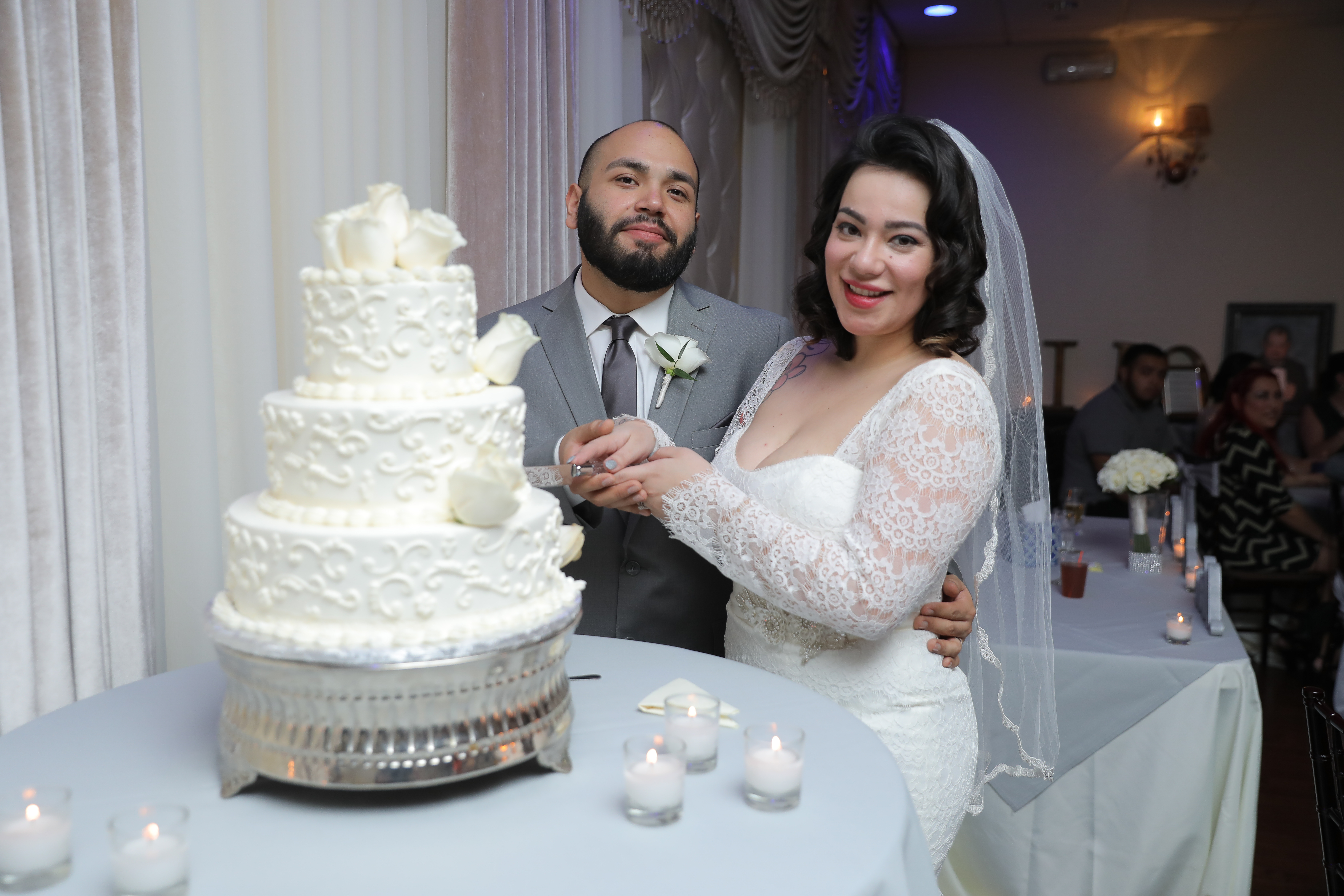 A groom carrying his little daughter on his vow renewal ceremony